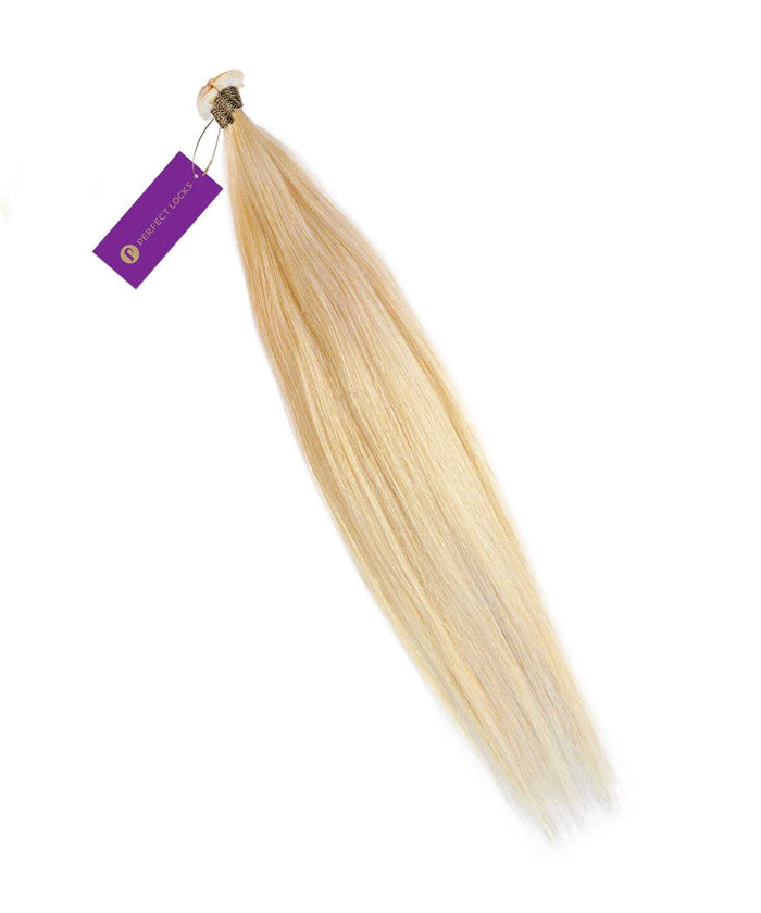 A bundle of Perfect Locks Straight Hybrid Weft Hair Extensions in Golden Brown  secured with a band and purple tag. The smooth Remy human hair tapers toward the ends.#color_platinum-blonde-(613)