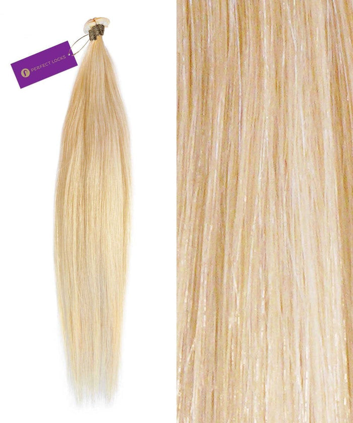 A bundle of Perfect Locks Straight Hybrid Weft Hair Extensions in Golden Brown  with a purple tag is on the left, while a close-up on the right showcases the smooth texture and golden tones of these human hair extensions.#color_platinum-blonde-(613)