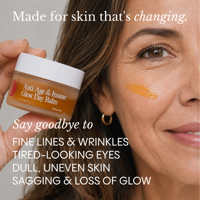 Frøya Organics Complete Mature Skin System — woman holding day balm with golden swatch