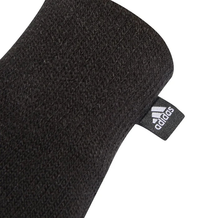 Black Adidas Three Stripes Conductive Gloves, designed for cold weather, with visible branding and textured fingertips for touch screen use.