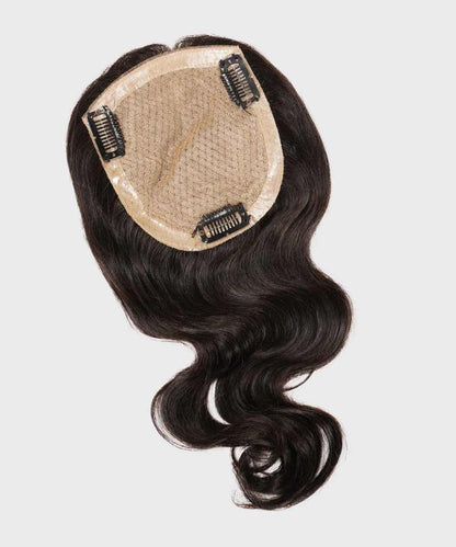 A dark brown wavy hair topper with a mesh base and three black hair clips, designed for a natural look, on a light background.