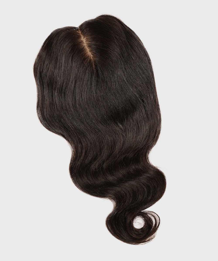A dark brown, wavy hair wig with a middle part showcased against a plain light background, featuring natural-looking volume and texture.