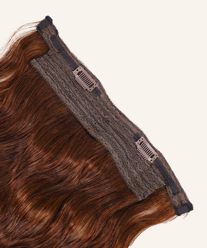 Close-up of Perfect Locks Wavy Perfect Crown Hair Extensions in Dark Auburn , with wavy strands and two metal clips on a lace base.#color_chocolate-brown-(3)