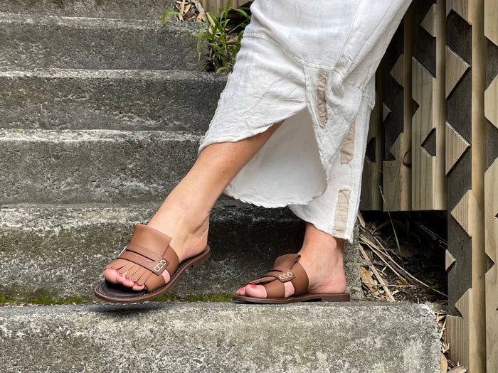 Classic European slide with fringe detail. Made in Spain from quality leathers, comfortable women's sandals/slides. In Tan.